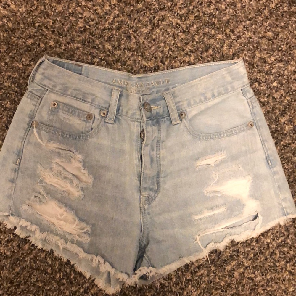 High rise ripped jean shorts.